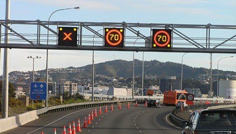HMI lane control signs over a New Zealand motorway